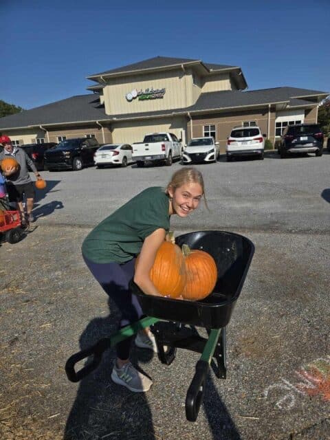 Volunteers unloading pumpkins at the Golden Strip Pumpkin Patch